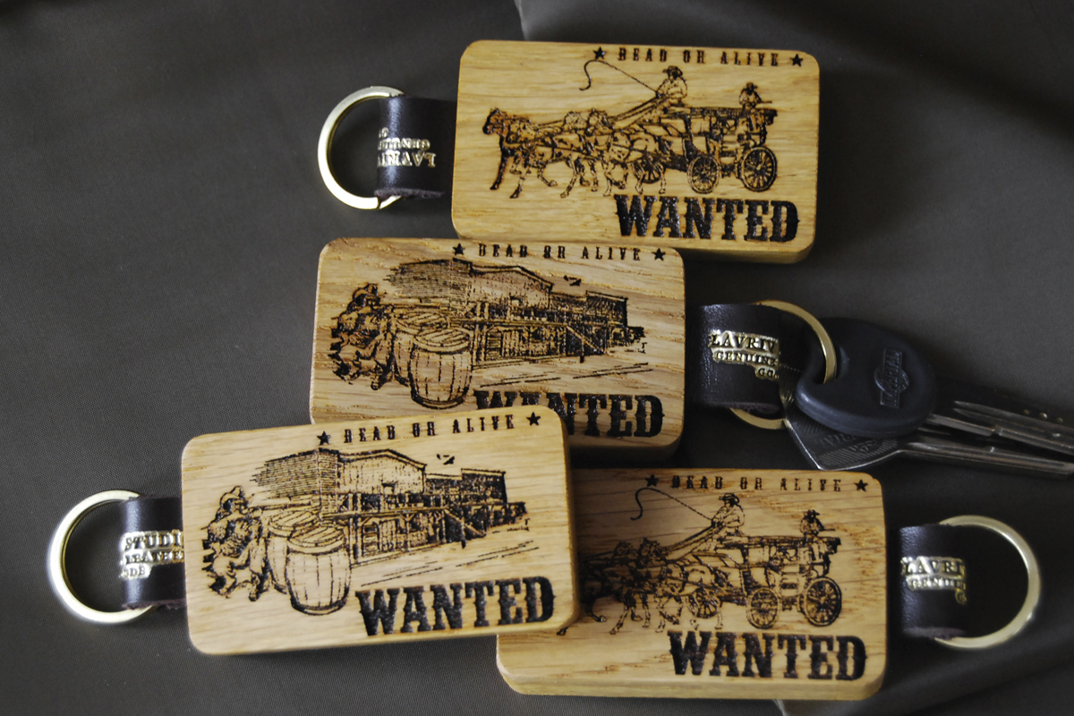 This unique wooden keychain is crafted from natural wood and is a true masterpiece of craftsmanship. Its surface features an exquisite illustration depicting the story of a wild west adventureâ€”a thrilling journey amidst untouched prairies and rugged mountain peaks.