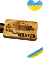 This unique wooden keychain is crafted from natural wood and is a true masterpiece of craftsmanship. Its surface features an exquisite illustration depicting the story of a wild west adventure—a thrilling journey amidst untouched prairies and rugged mountain peaks.