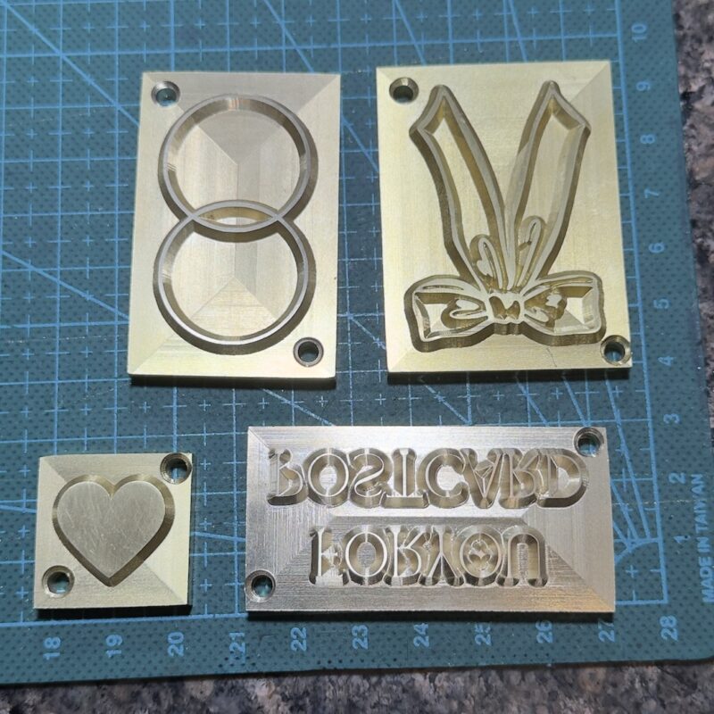 Custom CNC-milled brass die set for leather embossing by Lavriv Studio. Precision relief geometry, sharp detailing, and industrial-grade durability.